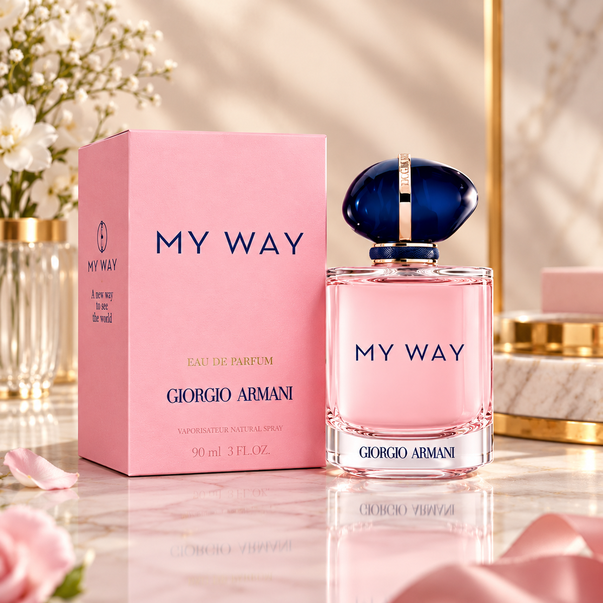 Giorgio Armani My Way Eau de Parfum bottle with its pink packaging box, displayed on a marble surface with soft pink petals and flowers.