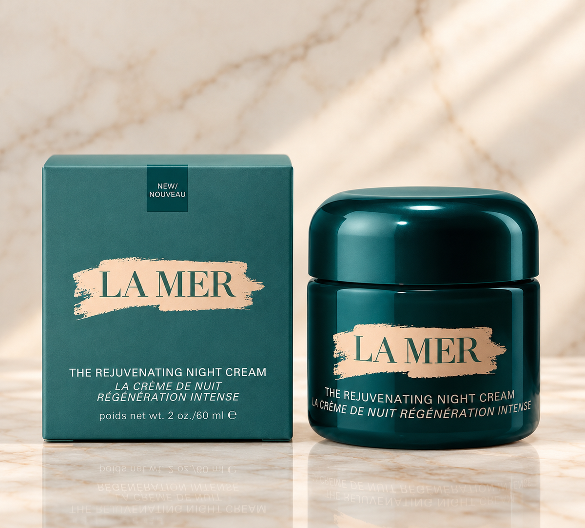 La Mer The Rejuvenating Night Cream 2 oz jar next to its teal packaging box on a light marble surface.