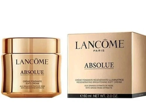 Lancôme Absolue brightening soft cream in a metallic gold jar, shown next to its matching gold packaging box on a plain white background.